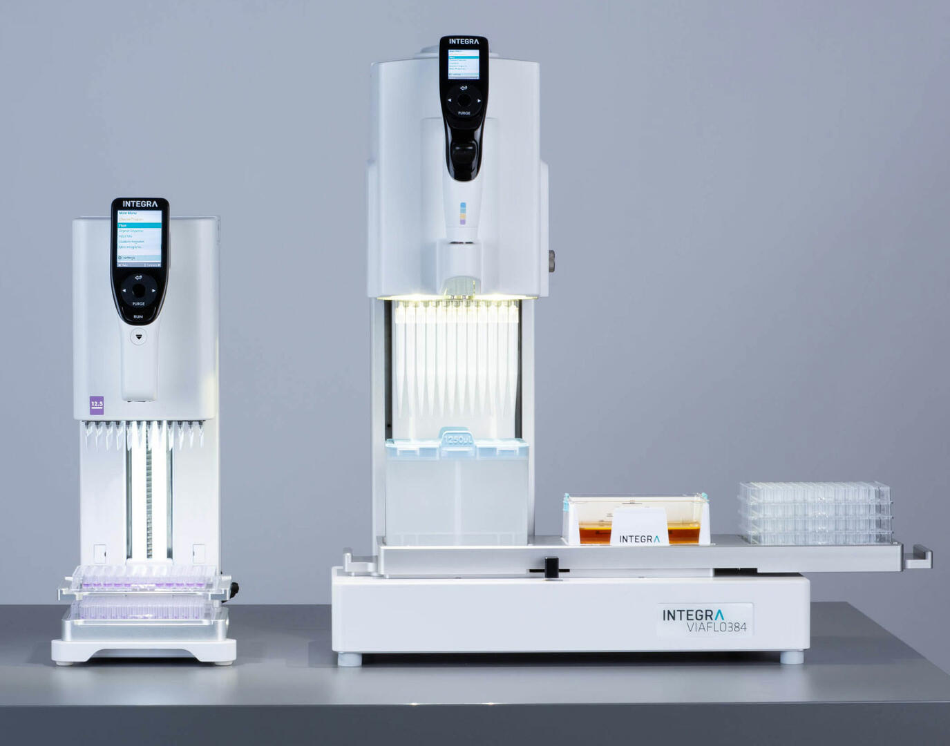 MINI 96 and VIAFLO VIAFLO 384 pipette on a lab bench