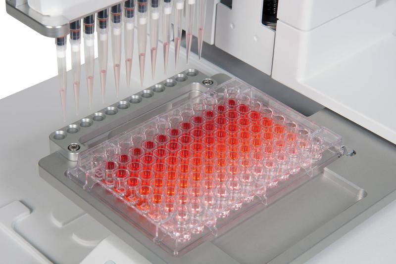 ASSIST automated pipetting system performing serial dilutions using a VIAFLO electronic multichannel pipette.