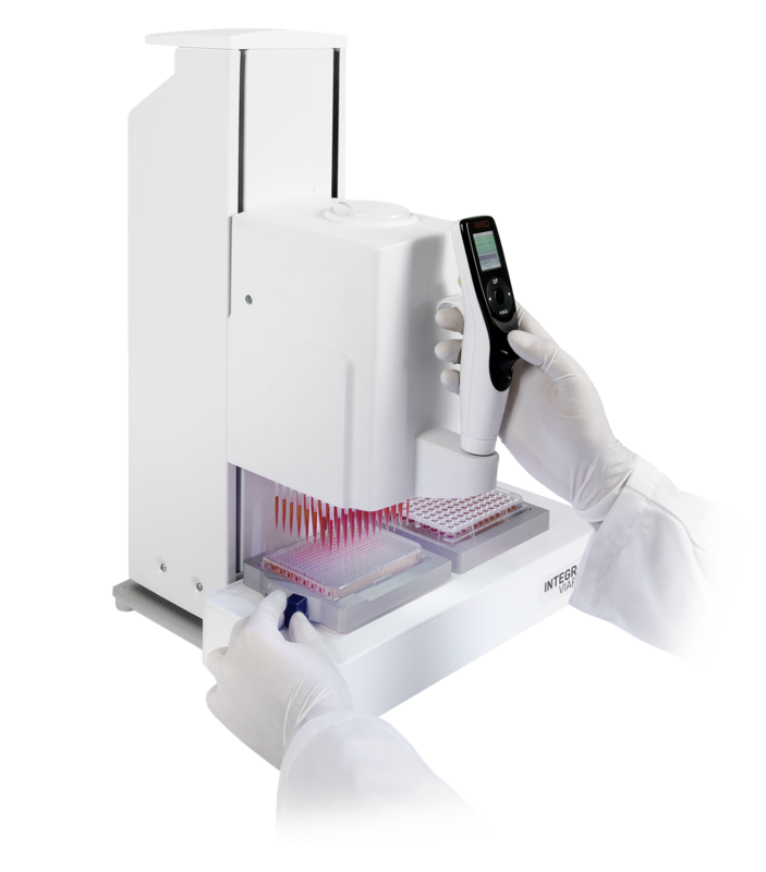 Scientist using the handheld VIAFLO 96 multichannel pipette to transfer liquid between well plates