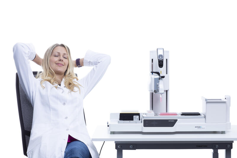 ASSIST PLUS carries out pipetting tasks while scientist is relaxing