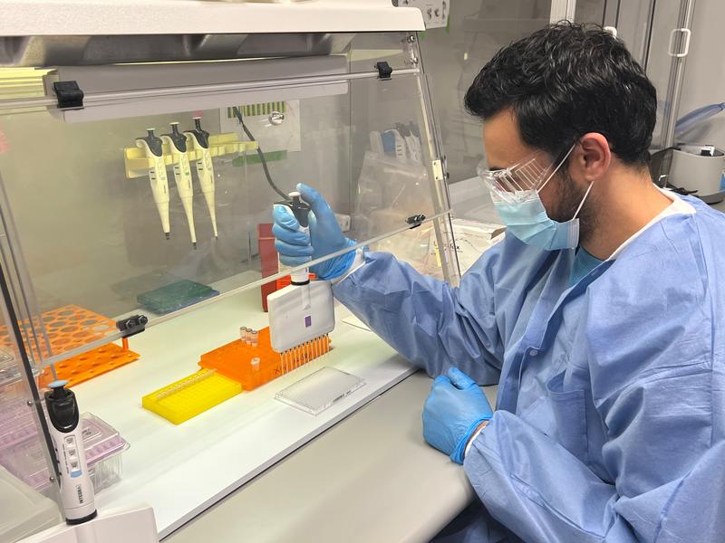 Fady Ettnas, Lab Manager at Matrix Diagnostics, using an EVOLVE manual pipette