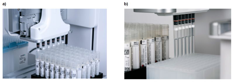 A close-up view of the ASSIST PLUS pipetting robot transferring samples from swab tubes to 96 deep well plate.