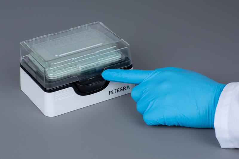 Scientist opening a PopTop Base one-handed