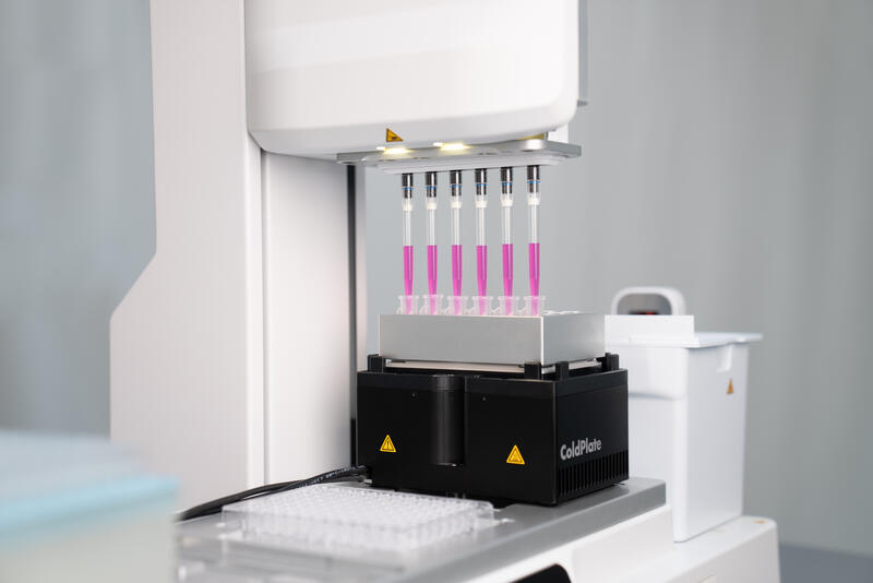 The COLDPLATE on the ASSIST PLUS pipetting robot mixing Matrigel using a VOYAGER pipette.