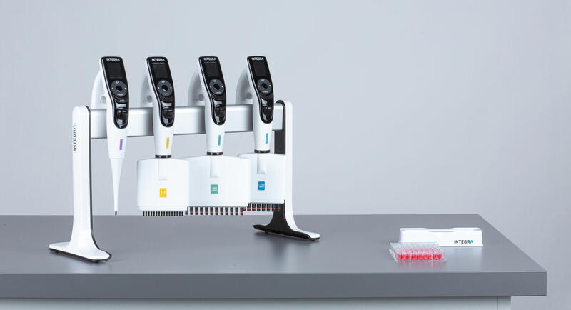 Different types of pipettes on a stand
