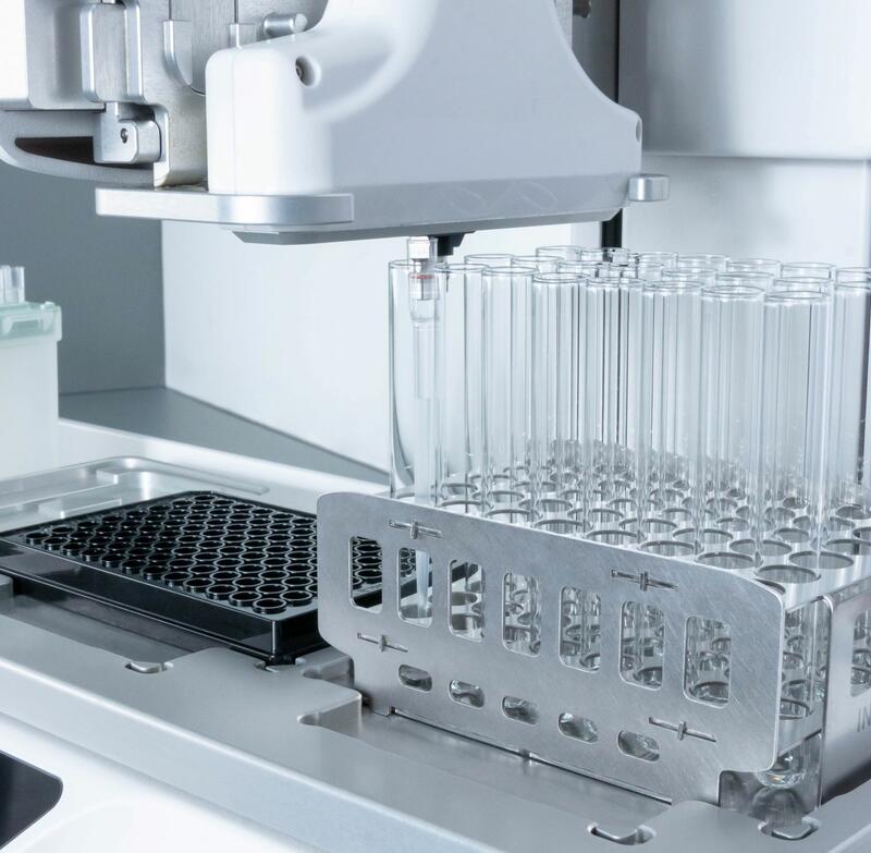 A close view of the ASSIST PLUS pipetting robot with the D-ONE single channel pipetting module transferring the LAL water.