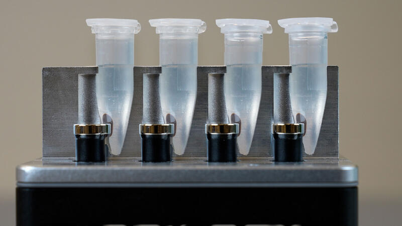 Tubes on the HEATMAG module during magnetic bead-based DNA purification with the Clean Blood & Tissue DNA Kit.