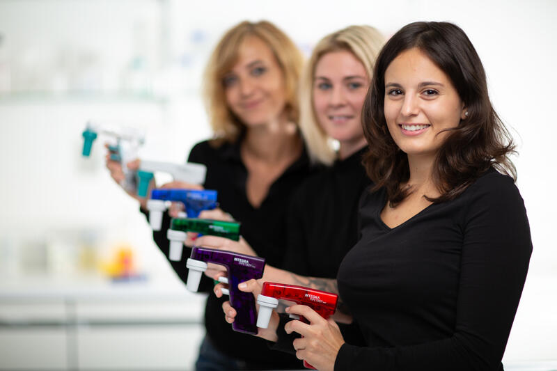 Full range of PIPETBOY acu pipette controllers in all colors showed in a row