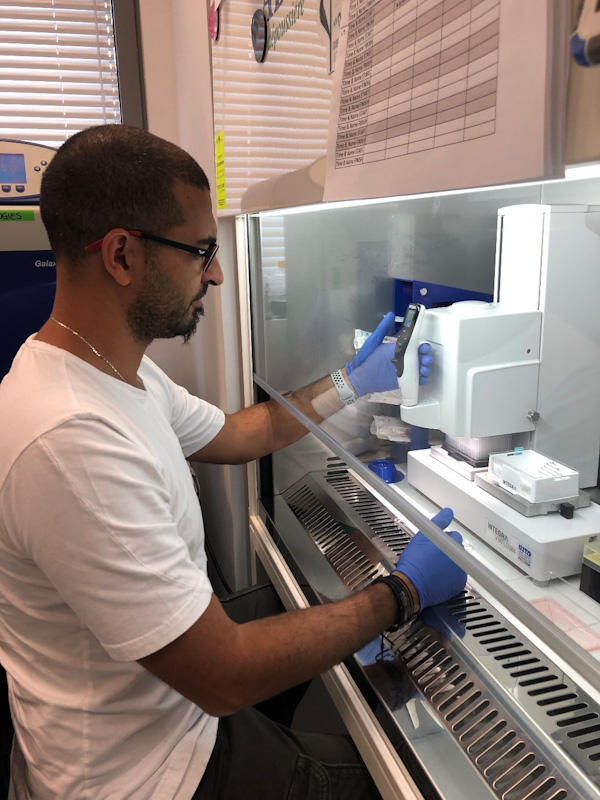 Dr Wissam Mansour using the VIAFLO 96/384 handheld electronic pipette